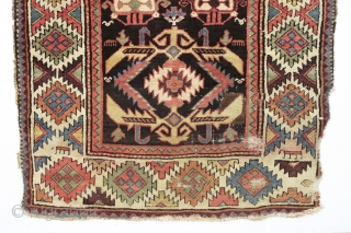 antique tribal long rug, probably nw persian. Interesting design featuring a very attractive bold border. "as found", very dirty with areas of heavy brown oxidation, wear, edge damage, a few stains, old  ...