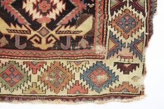 antique tribal long rug, probably nw persian. Interesting design featuring a very attractive bold border. "as found", very dirty with areas of heavy brown oxidation, wear, edge damage, a few stains, old  ...