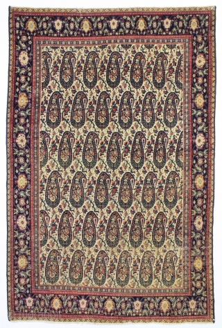 antique ivory ground persian senneh rug. Very nicely drawn and colored example in fair condition. Overall even low pile with no holes or tears and reasonably clean. "as found", reovercast sides with  ...