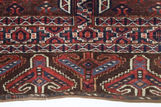 antique yomud ensi or small rug with eagle end panels and an unusual border design. Mostly good pile with nice tight weave. "as found", very very dirty with a couple holes and  ...