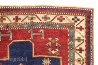 antique fachralo kazak prayer rug in overall good condition. Nice spacious drawing of this iconic type. All beautiful natural colors. Original edges and ends. I had a small stain repiled. Washed and  ...