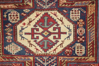 antique caucasian rug, probably shirvan, in pretty good condition with extra long keyhole style medallion and many charming animals. Overall fair even pile with good edges and ends. All good saturated natural  ...