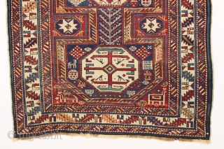 antique caucasian rug, probably shirvan, in pretty good condition with extra long keyhole style medallion and many charming animals. Overall fair even pile with good edges and ends. All good saturated natural  ...