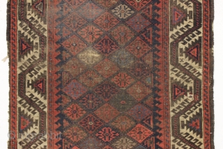 antique baluch rug displaying an early and interesting version of the turkman line, vine, or so called boat border. As found, very very dirty with wear as shown and priced accordingly. All  ...