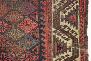 antique baluch rug displaying an early and interesting version of the turkman line, vine, or so called boat border. As found, very very dirty with wear as shown and priced accordingly. All  ...