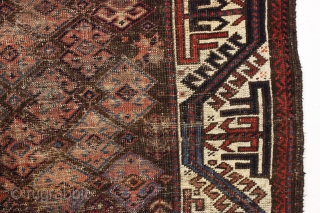 antique baluch rug with an interesting archaic waisted diamond lattice design. Colorful ivory ground turkman line border. As found, very very dirty with scattered old damage and wear as shown. Interesting study  ...