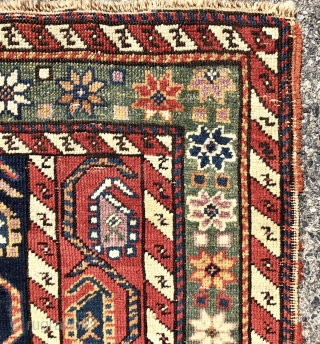 Antique small Caucasian rug with an interesting design and attractive old colors including pretty greens. This column design and the cochineal purple pile indicates karrabagh but the weave looks more south Caucasian?  ...