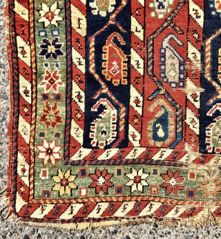 Antique small Caucasian rug with an interesting design and attractive old colors including pretty greens. This column design and the cochineal purple pile indicates karrabagh but the weave looks more south Caucasian?  ...