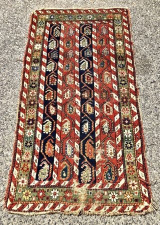 Antique small Caucasian rug with an interesting design and attractive old colors including pretty greens. This column design and the cochineal purple pile indicates karrabagh but the weave looks more south Caucasian?  ...