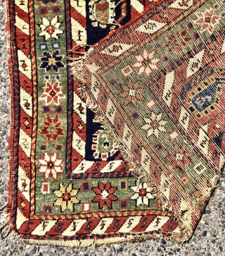Antique small Caucasian rug with an interesting design and attractive old colors including pretty greens. This column design and the cochineal purple pile indicates karrabagh but the weave looks more south Caucasian?  ...