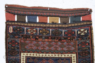 Antique original pair of interesting bagfaces, probably northwest Persian Kurdish. Unusual fields and eye catching skirt panels. Overall good even low pile. All saturated natural colors. Reasonably clean. Original closure tabs. Interesting  ...