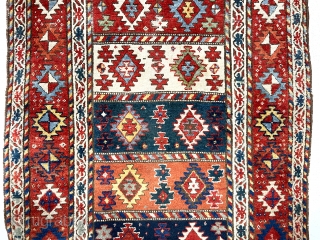 Antique large and colorful rug, probably northwest Persian, with an attractive unusual design. Overall good thick pile. Wide range of natural colors including multiple reds, pretty light blues, and strong yellows. Original  ...