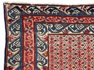 Antique Caucasian kuba or seichour rug. Unusual field design and iconic “running dog” borders. Overall good condition for the age with mostly even low pile. I see what looks like a small  ...