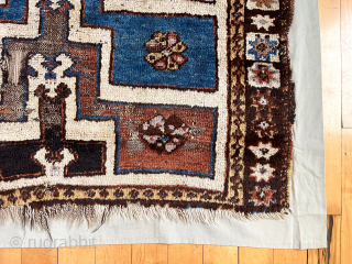 Early Turkish prayer rug fragment. Coarse and rugged. Lovely purple. First half 19th c. or earlier. 
43” x 55” not including cloth mounting.          
