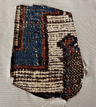 Early Turkish prayer rug fragment. Coarse and rugged. Lovely purple. First half 19th c. or earlier. 
43” x 55” not including cloth mounting.          