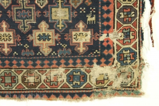 Old tribal mystery rug fragment. Northwest Persian? I don't know what it is but I like it. All good natural colors including a fine grape purple. Very dirty and damaged as shown.  ...