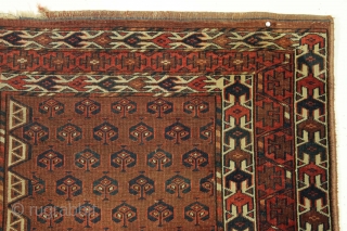 Antique yomud ensi with blue elem panel. Offered "as found", unwashed and as shown. All natural colors. Mostly decent pile. Some center wear. 19th c. weaving. 4'5" x 5'7"    