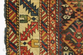 early caucasian kuba long rug. Superb color and unusually varied and delicate drawing. I don't think I've ever seen this much variety of elements in a similiar rug. Heavily oxidized brown ground  ...