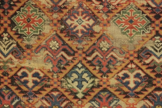 early caucasian kuba long rug. Superb color and unusually varied and delicate drawing. I don't think I've ever seen this much variety of elements in a similiar rug. Heavily oxidized brown ground  ...