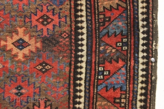 antique very colorful baluch rug with an attractive design featuring a very nice border. Overall mostly very good pile with just a bit of scattered light wear. I see one dime size  ...