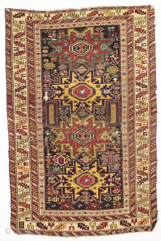 early caucasian lesghis star rug with incribed date of 1821. Probabaly shirvan. Older example with very wide range of vibrant natural colors. Delicate complex drawing with some charming elements I have not  ...