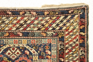 Antique little caucasian prayer rug, probabaly kuba area, with a fascinating field design and an interesting main border. I have never had a rug with this field design. Overall fair condition with  ...