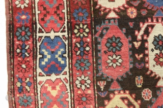Antique early tribal rug probably northwest persian with an unusual and eye catching border. Overall good condition. All natural colors with pretty blues, greens and nice old yellows. Although one might think  ...