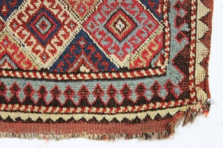 antique little mystery weaving. Looks like a kurdish piece but the weave, palette and tall format all indicate something else. Caucasian? All natural colors. Turkish knotted. Sides are original with weft returns.  ...