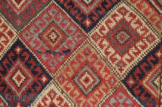 antique little mystery weaving. Looks like a kurdish piece but the weave, palette and tall format all indicate something else. Caucasian? All natural colors. Turkish knotted. Sides are original with weft returns.  ...