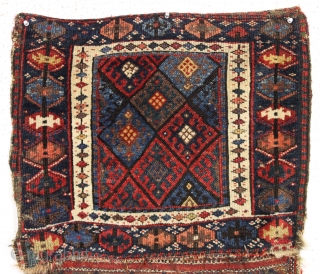 antique complete connected pair of kurdish bags with an unusual ashik gul border. Mostly good pile with a few spots of wear and edge roughnes. All natural colors featuring a nice aubergine,  ...