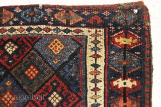 antique complete connected pair of kurdish bags with an unusual ashik gul border. Mostly good pile with a few spots of wear and edge roughnes. All natural colors featuring a nice aubergine,  ...