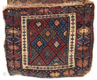 antique complete connected pair of kurdish bags with an unusual ashik gul border. Mostly good pile with a few spots of wear and edge roughnes. All natural colors featuring a nice aubergine,  ...