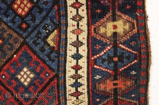 antique complete connected pair of kurdish bags with an unusual ashik gul border. Mostly good pile with a few spots of wear and edge roughnes. All natural colors featuring a nice aubergine,  ...