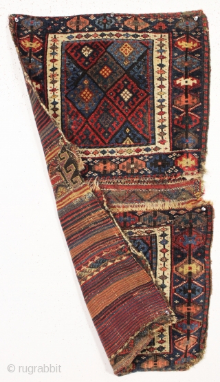 antique complete connected pair of kurdish bags with an unusual ashik gul border. Mostly good pile with a few spots of wear and edge roughnes. All natural colors featuring a nice aubergine,  ...