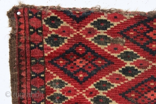 antique little turkoman ersari fragment with an interesting ikat type design. All natural colors featuring multiple reds deep green. Reasonably clean. Original goat hair 3 cord selvages. Good age, ca. 1880 or  ...