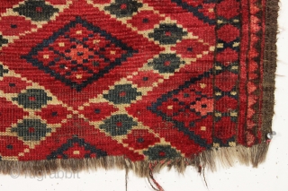 antique little turkoman ersari fragment with an interesting ikat type design. All natural colors featuring multiple reds deep green. Reasonably clean. Original goat hair 3 cord selvages. Good age, ca. 1880 or  ...