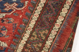 antique small soumak carpet. Classic design with some charming tribal elements including 12 rockects and 6 tiny people. Nice older example in good condition for the age. All natural colors featuring a  ...