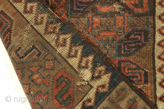 Antique baluch rug fragment. Rare design. All good natural colors. Edge damage all around, small old repairs, moth nibbles, small tears. Just had a quick wash. Good age, ca. 1880 or earlier.19"  ...