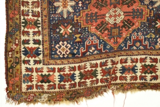 Antique NW Persian rug. Ineluctable. Old, damaged and beautiful as shown. Cleaned but not repaired. All natural colors including a fine purple. Sewn up tears, wear, edge loss. Ca. 1860. 5' 2"  ...