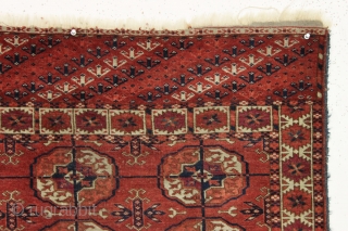 antique little tekke rug in good condition with all natural colors and interesting skirt panels. Even pile with slight center wear as shown. "as found", no repairs and could use a good  ...