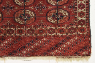 antique little tekke rug in good condition with all natural colors and interesting skirt panels. Even pile with slight center wear as shown. "as found", no repairs and could use a good  ...