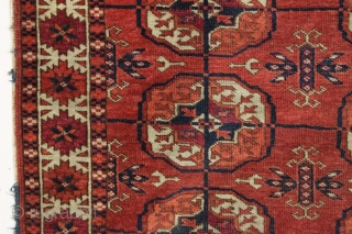 antique little tekke rug in good condition with all natural colors and interesting skirt panels. Even pile with slight center wear as shown. "as found", no repairs and could use a good  ...