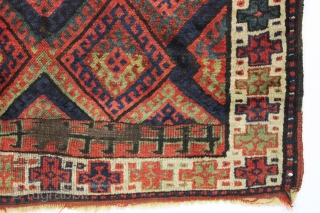 antique kurdish rug with classic diamond design field and some unusual features. Interesting quirky designs added to either end of the field and unusual very light green pile. This very light green  ...