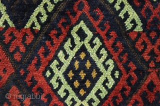 antique kurdish rug with classic diamond design field and some unusual features. Interesting quirky designs added to either end of the field and unusual very light green pile. This very light green  ...