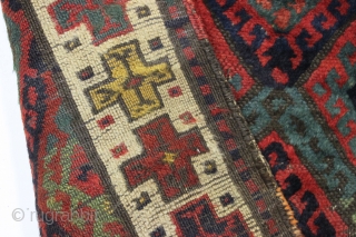 antique kurdish rug with classic diamond design field and some unusual features. Interesting quirky designs added to either end of the field and unusual very light green pile. This very light green  ...