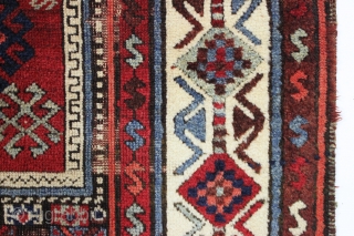 antique east anatolian kurdish long rug. Good older example of a classic type. In fair condition with much good thick pile combined with an almost completely corroded ground. All natural colors. Edges  ...