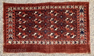 Antique small yomud chuval with rich deep natural colors, fine weave, and elegant minor guls. Overall very low pile with a thin blanket like handle. Remnant original selvages. Reasonably clean. Good age,  ...