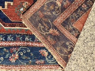 Antique large Caucasian rug with some unusual features. Although presumably Kazak, possibly Armenian, with Lori Pombak medallions. The rug has unusually open drawing and is fitted with a very  delicate floral  ...