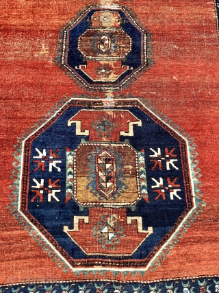 Antique large Caucasian rug with some unusual features. Although presumably Kazak, possibly Armenian, with Lori Pombak medallions. The rug has unusually open drawing and is fitted with a very  delicate floral  ...