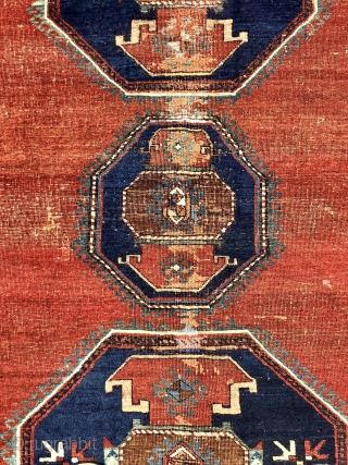 Antique large Caucasian rug with some unusual features. Although presumably Kazak, possibly Armenian, with Lori Pombak medallions. The rug has unusually open drawing and is fitted with a very  delicate floral  ...